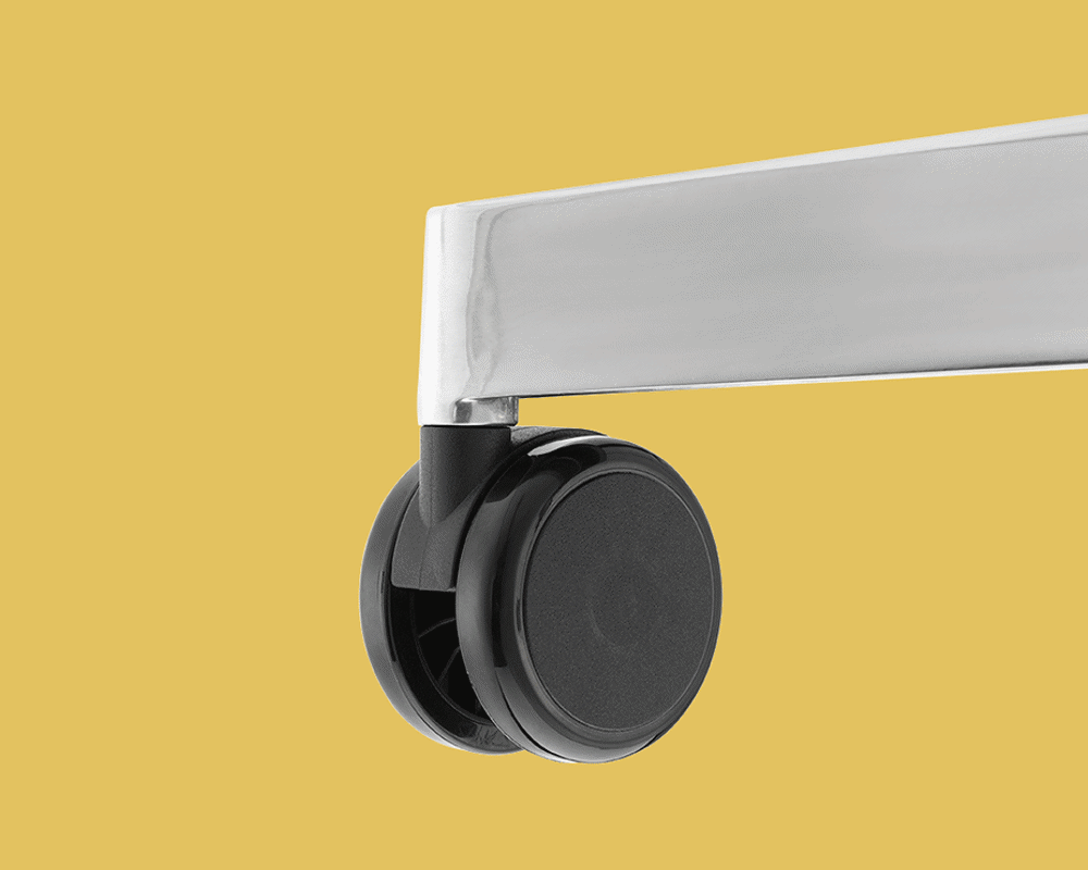Moveo table; Black multi-directional castor; Detail; yellow background
