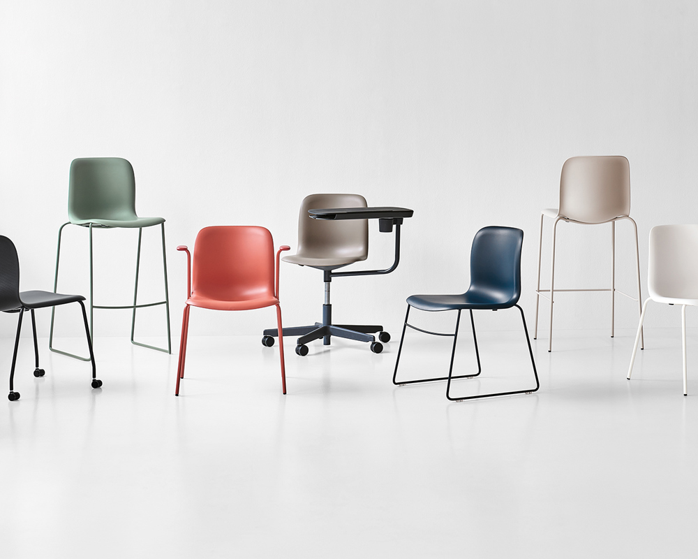 An installation of numerous colourful variants of the SixE chair