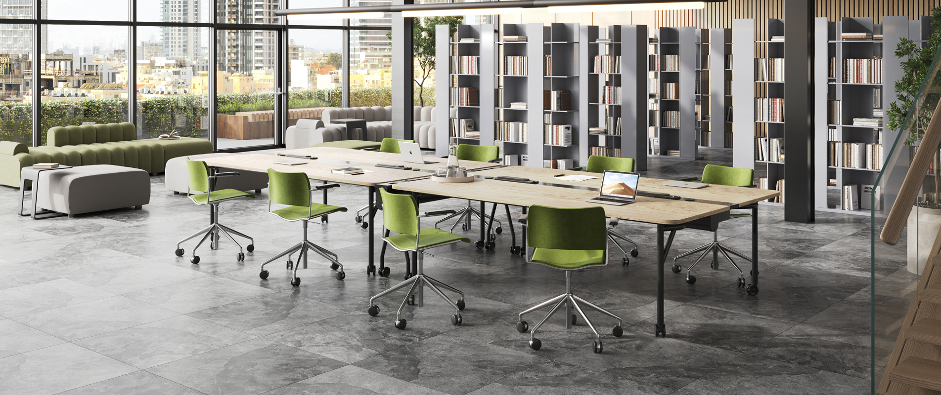 An installation image features Folding Surfaces tables in a collaborative office setting and green 40/4 swivel chairs