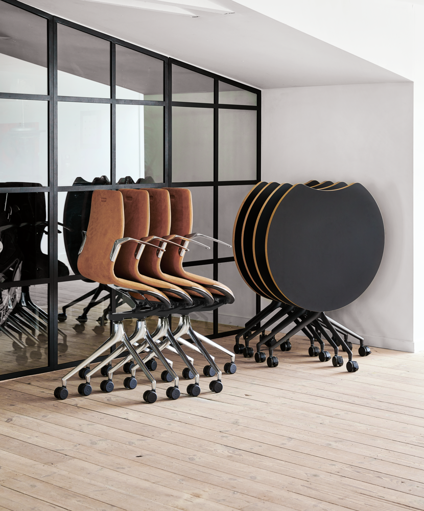 An installation image of nested AS400 tables and AS100 chairs