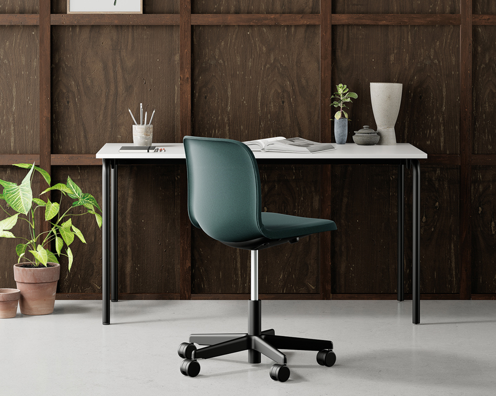 Sixe swivel chair in front of the Usu table in a room with a wooden wall