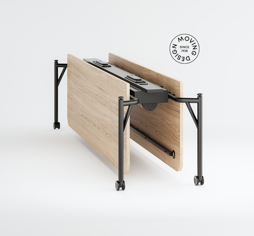A Folding Surfaces bench desk with oak veneer top, folded, on a plain grey background